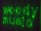 Logo Woody Music Som Profissional